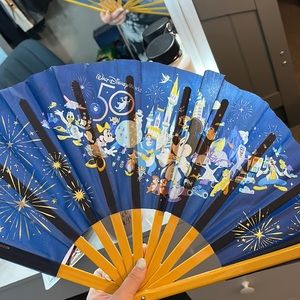 never used , disneys 50th fan